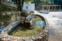 Yixinju Hostel - บริการรถรับส่ง