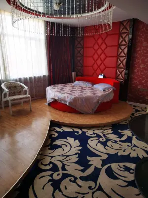 Kangyi Theme Hotel Hôtels à : Bannière arrière de Hanggin