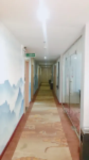 Junyi Hotel (Mengzhou Bus Station)