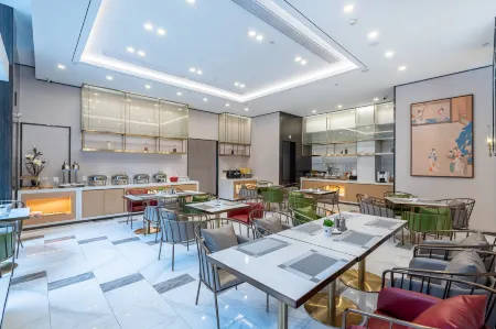 Magnotel Hotel (Xuzhou Suning Plaza) Отели рядом с достопримечательностью «Pengcheng Square»