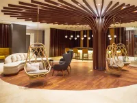 The Reef 28 Hotel & Spa - Luxury Adults Only - All Suites - with Optional All Inclusive Отели рядом с достопримечательностью «Пляжный клуб Kool»