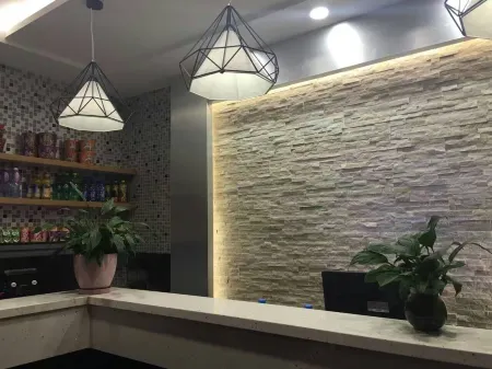 Yuzhong tucaizhu Business Hotel Отели рядом с достопримечательностью «Center Square»