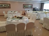 Daqing Huaxi Boutique Hotel - فطور