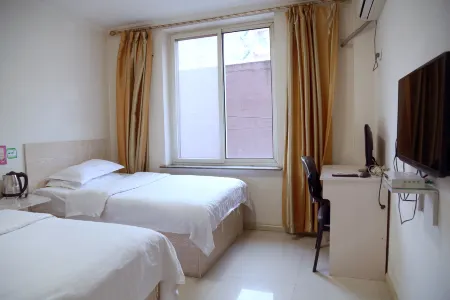 Xinriyue Business Hotel Отели рядом с достопримечательностью «Fuxin Higher Training College»