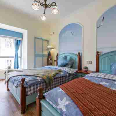 涼山陽光小住公寓（海潮路分店） Rooms