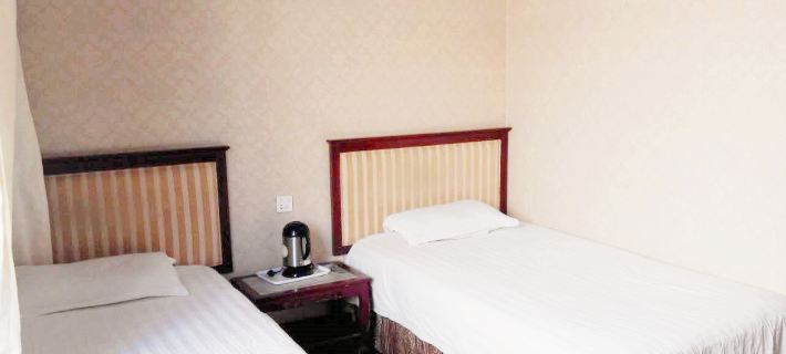 Fuxinbaifang Hotel Hotele w: Fuxin
