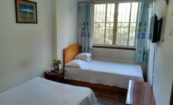 Panzhihua Yujia Guest House - Housity