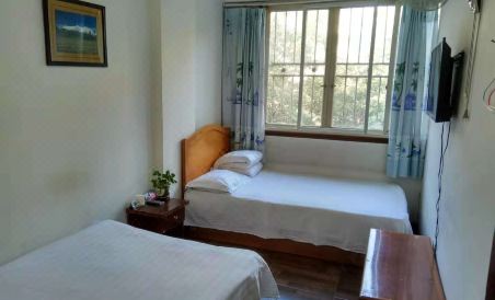 Panzhihua Yujia Guest House - Housity