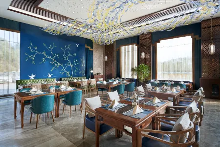 Shama Daqing Serviced Apartment Hotel Отели рядом с достопримечательностью «Daqing Times Square»