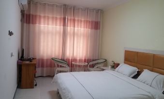 Xinzheng Qiandu Hotel