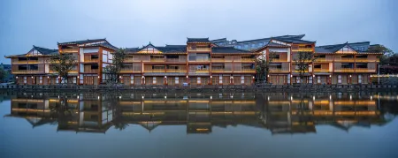 Huajianchi Chunshang Hot Spring Hotel Отели рядом с достопримечательностью «Huajianchi·chunshang Hot Spring Theme Park»