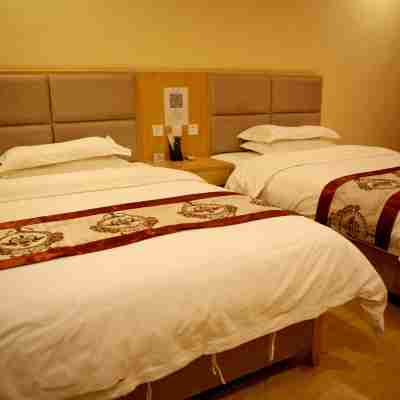 Deyuan Business Hotel Rooms