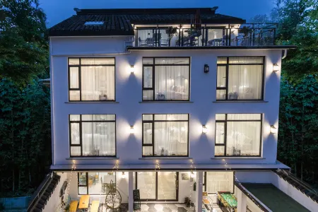 Lanhu Xiaozhu Hostel Отели рядом с достопримечательностью «Ботанический сад Цзяньнан»