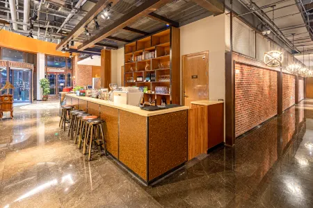 James Joyce Coffetel Hotel (Tianjin Caozhuang Metro Station Traffic College) Отели рядом с достопримечательностью «Zhonghuan Information College Tianjian University of Technology»