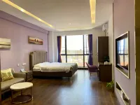 Chenzhou Zhongyi Apartment Hotel - Condos