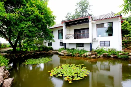 Huadao Holiday Hotel Отели рядом с достопримечательностью «Chengdu Sports Institute (New Campus)»