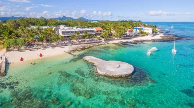 Le Peninsula Bay Beach Resort & Spa Hotels in Пуэнт Десни