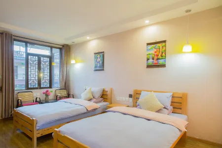 Lugu Lake Pumi Sunshine Hotel Отели рядом с достопримечательностью «Langfang»