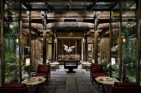 Sansheng Yizhai Hostel Отели рядом с достопримечательностью «Dipucun»