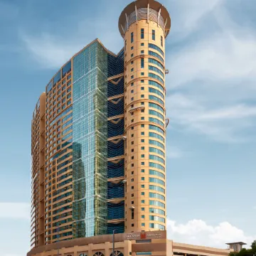 Grand Millennium Al Wahda Hotel and Executive Apartments Abu Dhabi Отели рядом с достопримечательностью «Дворец Al Manhal»
