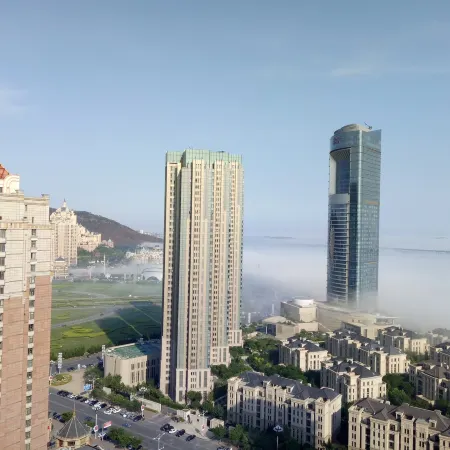 Dalian Yipin Fashion Leisure Apartment Отели рядом с достопримечательностью «Парк Синхай»