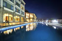 Beidaihe Bei Hua Yuan Sea View Hotel (Beidaihe Biluo Tower) Hotels in East Beach. Biluota Bar Park