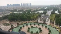 Qidong Risheng Donghai Holiday Apartment - Homestays
