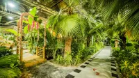 โรงแรมบ้านสวนโกลเด้นโคสต์แม่น้ำเหลือง หนิงเซียะ - พร้อมอาหารเช้า