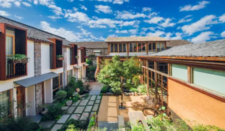 Qixianli Homestay (Yiwu International Trade City) Отели рядом с достопримечательностью «Yiwu Shuanglin Temple»