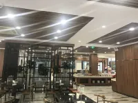 Xinyinzhan Hot Spring Holiday Resort - servizio colazione