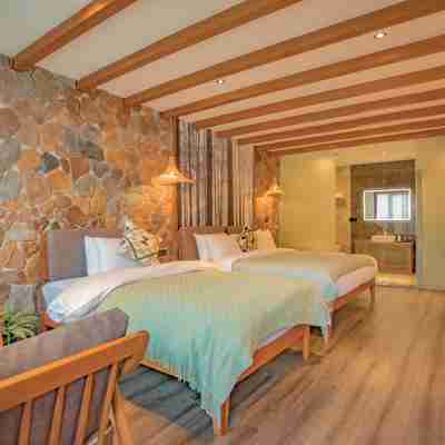 瀘沽湖璞山雲美女兒國度假飯店 Rooms