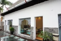 Jinghong Manzhelan Inn - Holiday Apartments