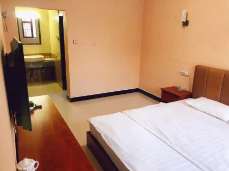 Kezuo Zhongqi New Land Hotel