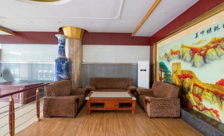 Xinjulong Hotel - Housity
