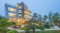 Floral Hotel · Xuan Hu Ge Hangzhou Hotel Отели рядом с достопримечательностью «Ляошаньское море»