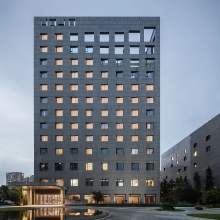 Xinchang Wozhou Junyi Hotel