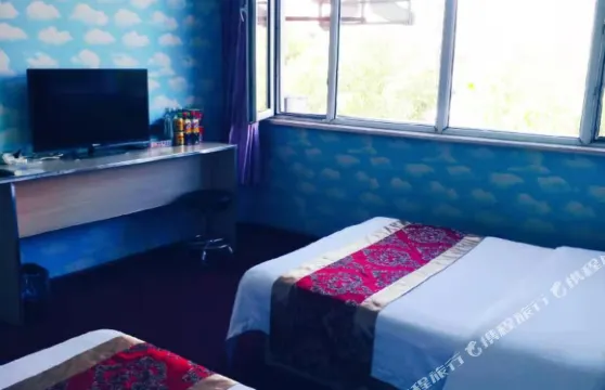 扎魯特旗旭曰商務賓館