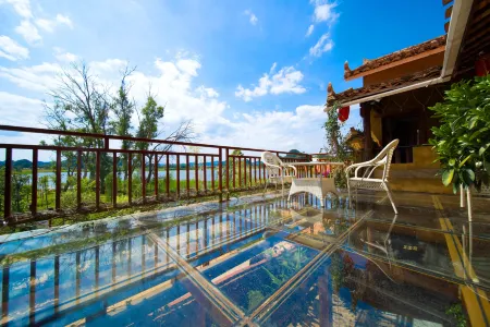 Puzhehei Guanhu Su Отели рядом с достопримечательностью «Fairy Cave»