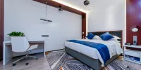 Wanxiang Hotel (huaihua guojishangmaocheng guomaodian) - Elegant Single Room (No Window)