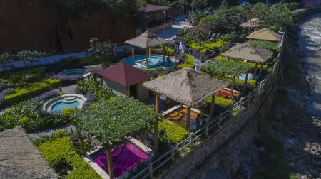 Yuanshi Buluo Wild Hot Spring Resort