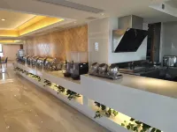 โรงแรมนานาชาติอี้กู่ - พร้อมอาหารเช้า