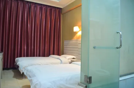 Wuzhi Jinhui Hotel Отели рядом с достопримечательностью «Huanghe Jiaotong University (Shangde Campus)»