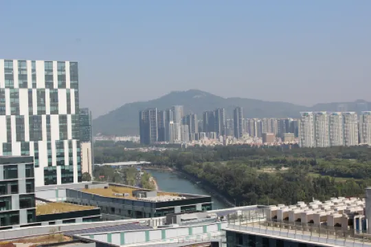 Ivy Service Apartment (Shenzhen Bay) Отели рядом с достопримечательностью «Baojindi Nanshan International Tennis Club»