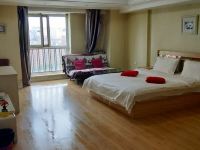 哈尔滨向日葵公寓 - 轻奢投影大床房
