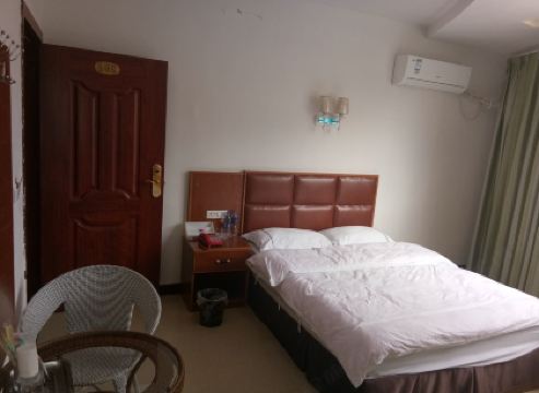 Huang Ping Yan Fei Business Hotel