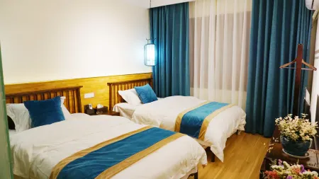 Baili Rhododendron Qingyi Yashe Inn Отели рядом с достопримечательностью «Shiniu Tourism Town»