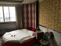 上海品汇假日宾馆 - 温馨圆床房