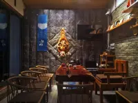 Lijiang Yixing Huaxi Inn - إقامة ريفية