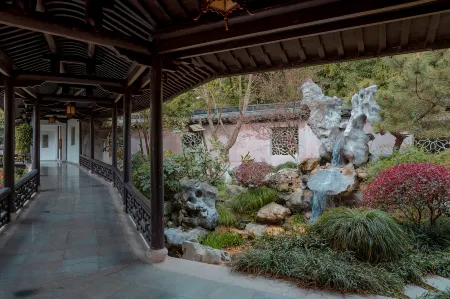 Eden Club House Отели в г. Тунсян