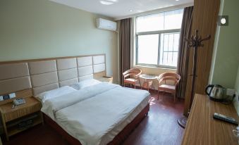 Jiujiang Shenlong Apartment Hotel